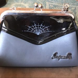 Sourpuss purse